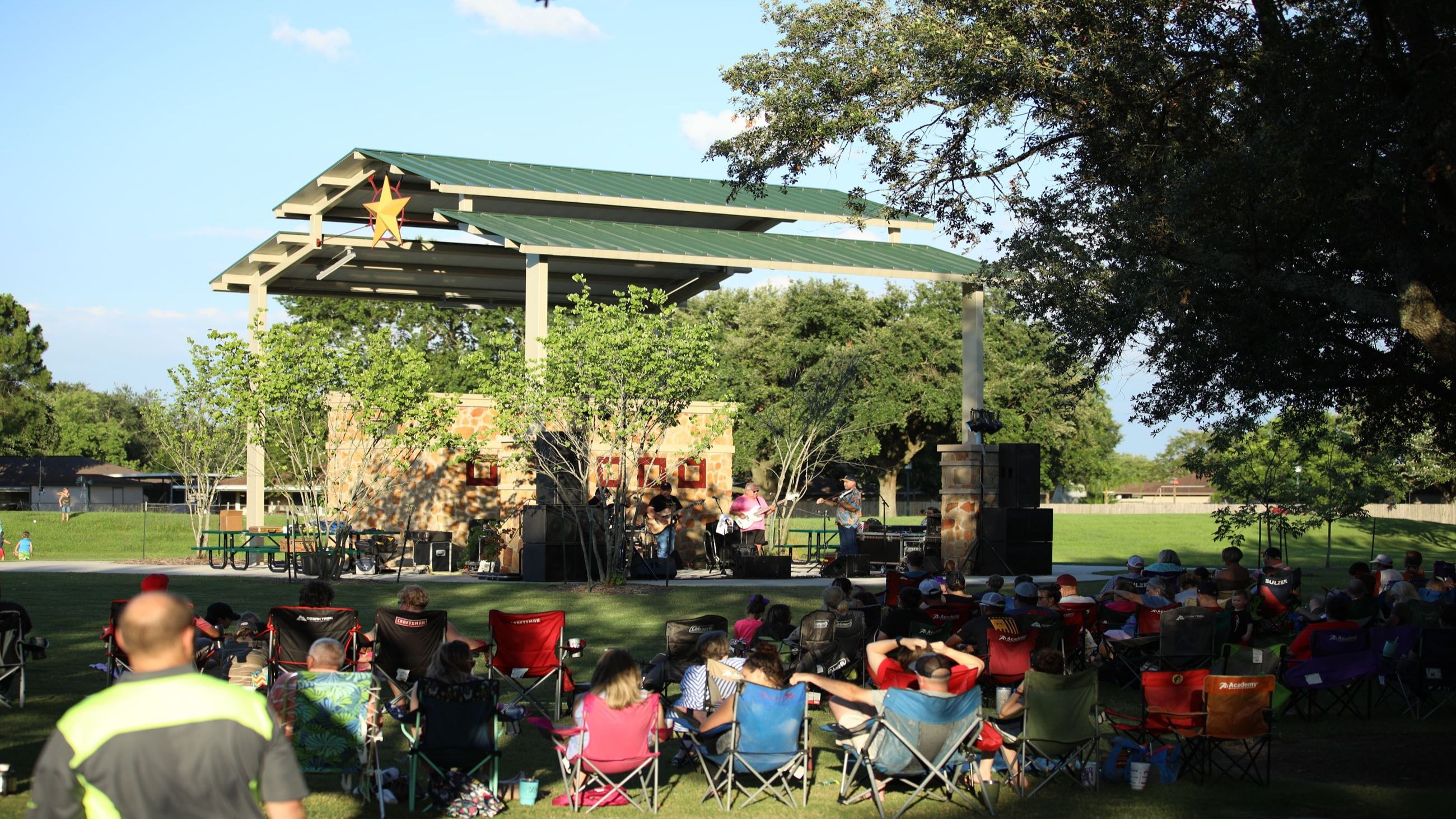Group enjoying concert at Dow Park Pavilion